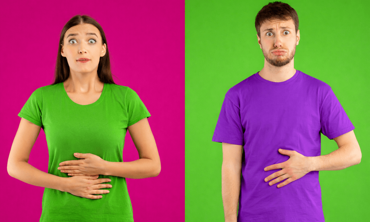 muž a žena s bolestí břicha